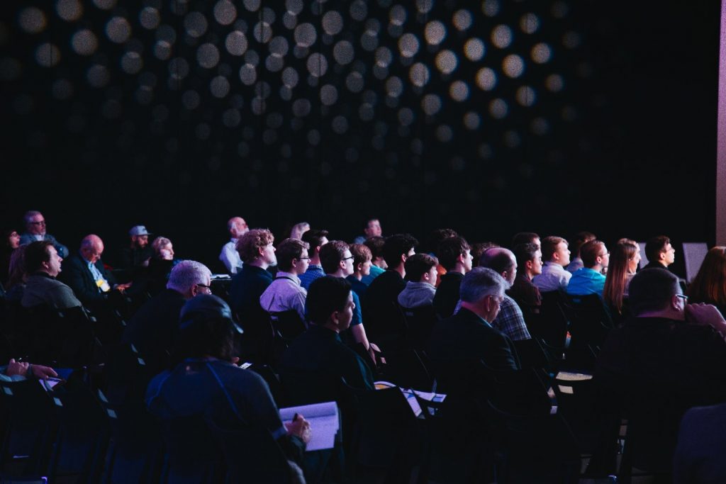 audience members at conference