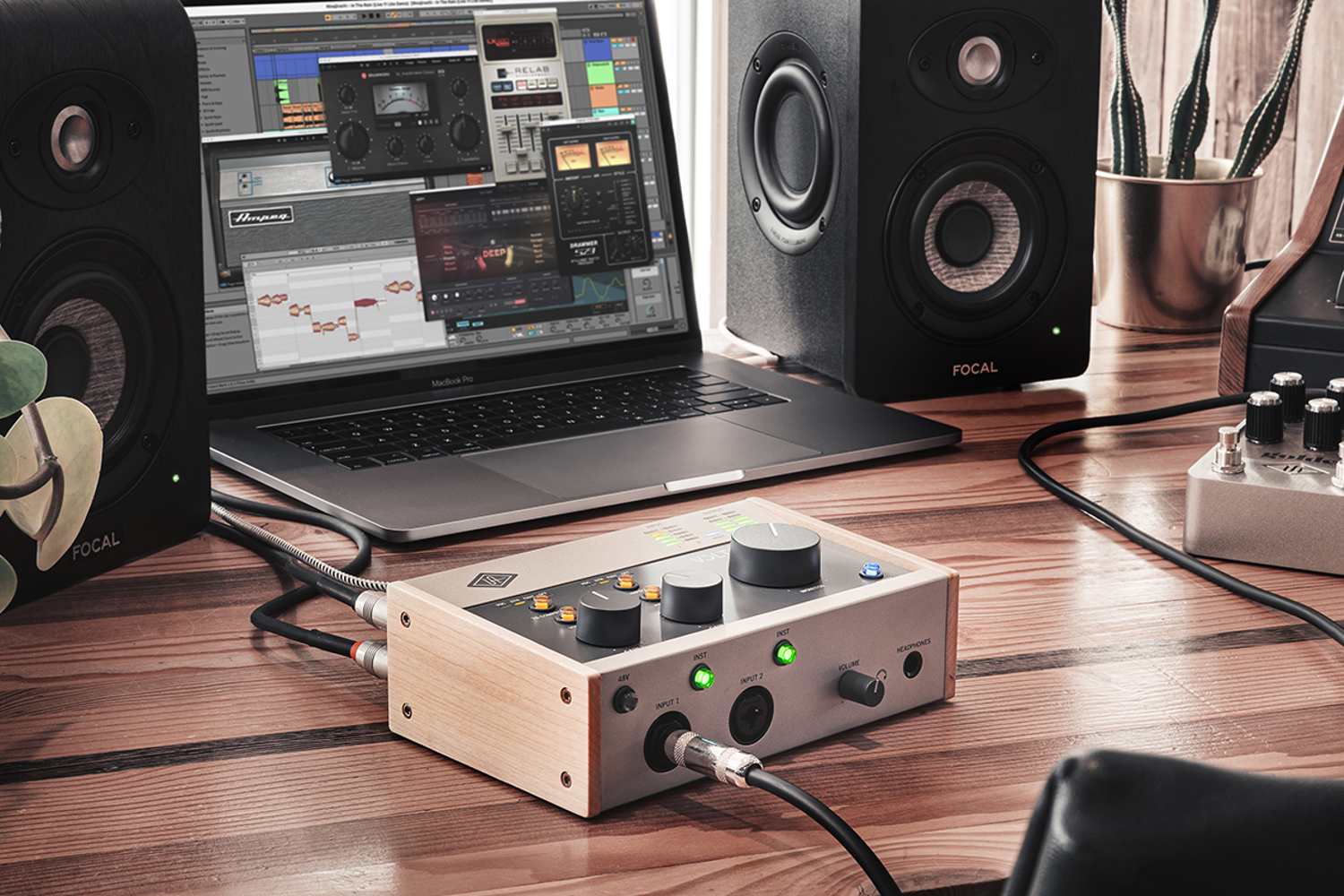 Universal Audio Volt 276 audio interface on desk with music production equipment
