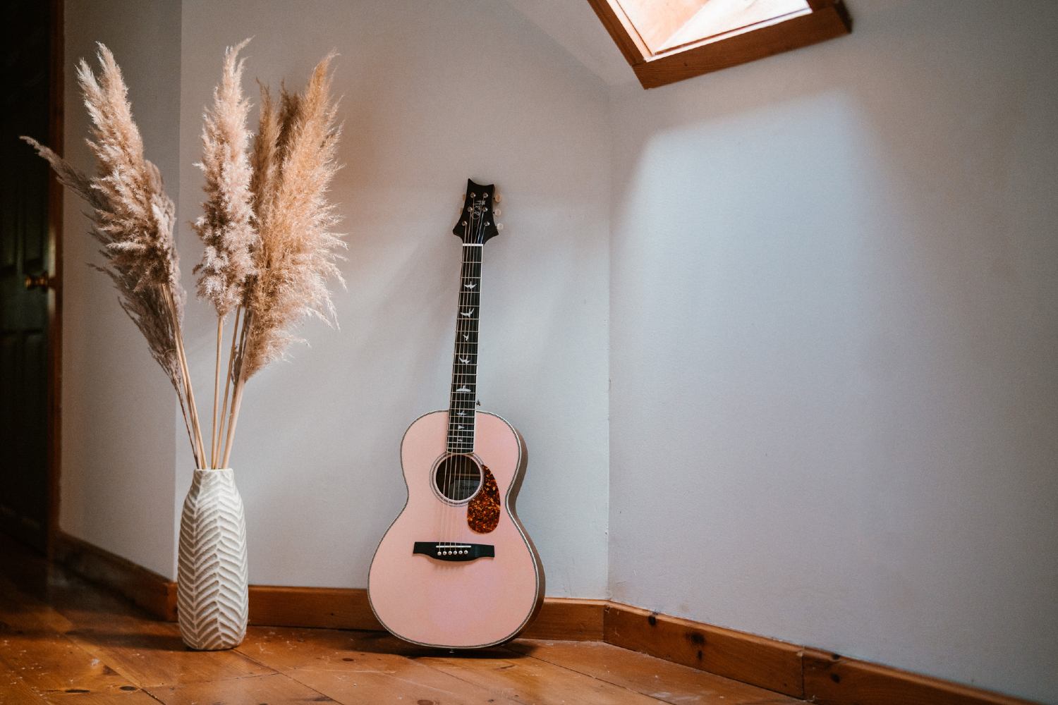 PRS Lotus Pink SE P20E guitar in home