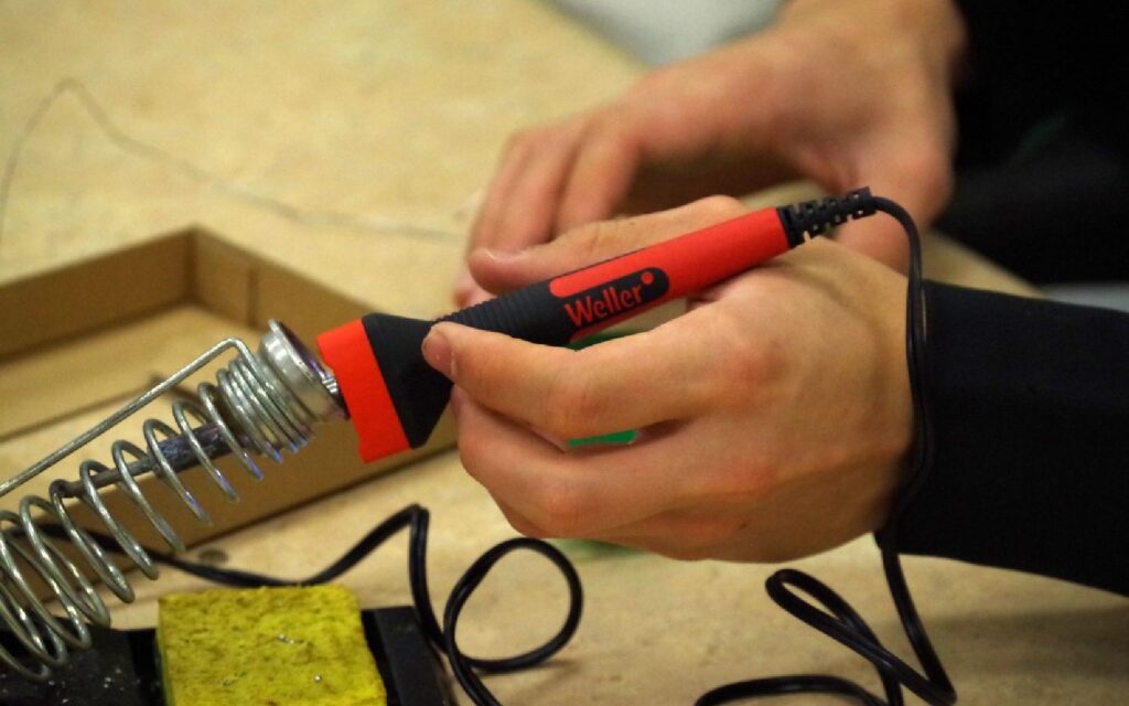 Guitar player soldering iron
